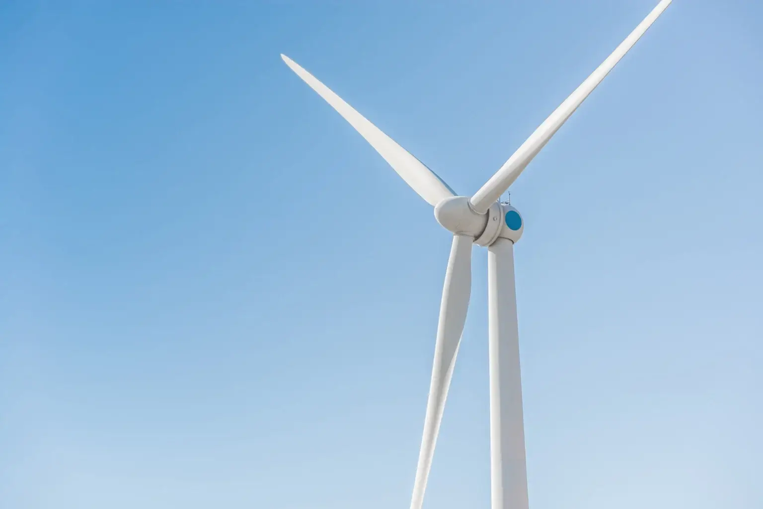 A wind turbine against open sky